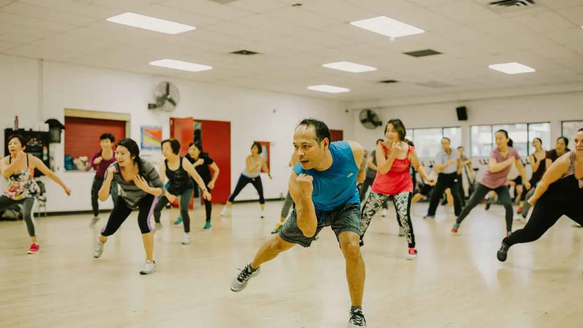 Participants exercising in a group fitness class at the Langara Family YMCA