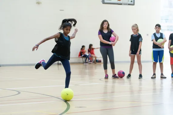 Soccer program participant doing drills