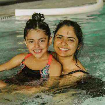 A mother and daughter swimming at the YMCA in Vancouver